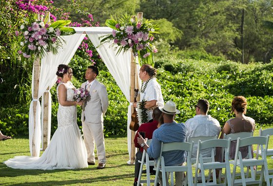 A private estate wedding at Gannon's Lower Knoll with a floral archway and seated guests