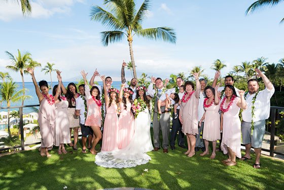A full Maui wedding celebration with cake, musician, and premium flowers